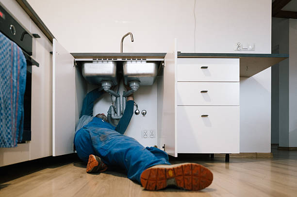 Professional Plumbing technician working in Winter Beach, FL